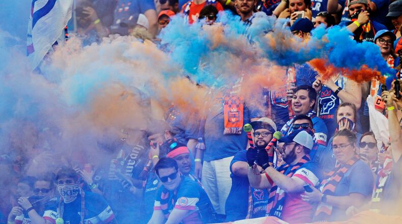 FC Cincinnati fans in the Bailey cheer on their team during their 2017 Lamar Hunt U.S. Open Cup semifinal game against New York Red Bulls Tuesday, Aug. 15 at Nippert Stadium on the University of Cincinnati Campus in Cincinnati. NICK GRAHAM/STAFF