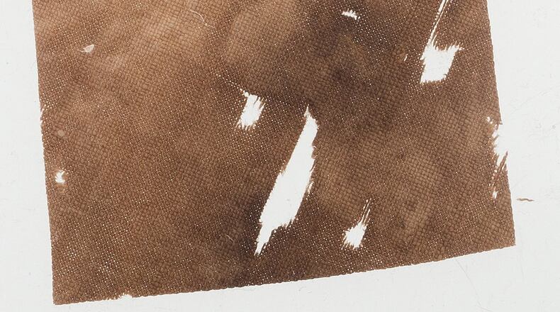 A piece of musin from the wing of the 1903 Wright Flyer went to the moon and back with Neil Armstrong on Apollo 11. COLLECTIBLES AUTHENTICATION GUARANTY