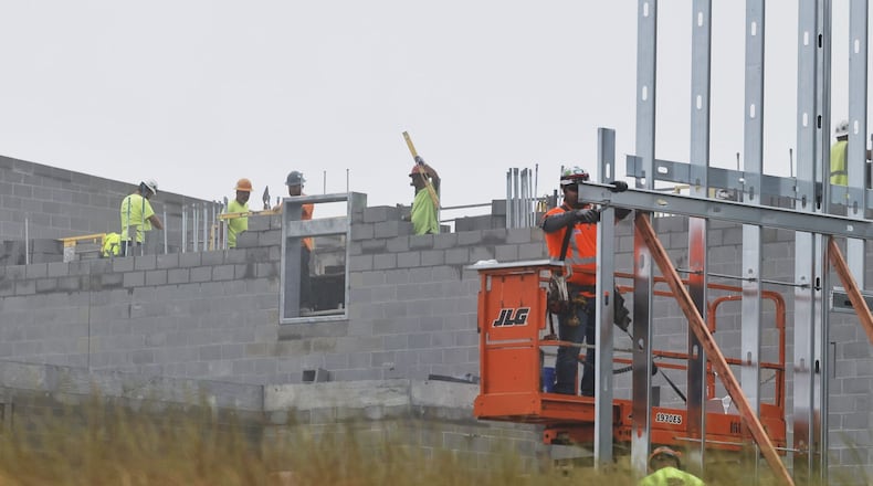 Construction crews work on the new Middletown Division of Fire headquarters on Yankee Road Monday, June 3, 2024 in Middletown. NICK GRAHAM/STAFF