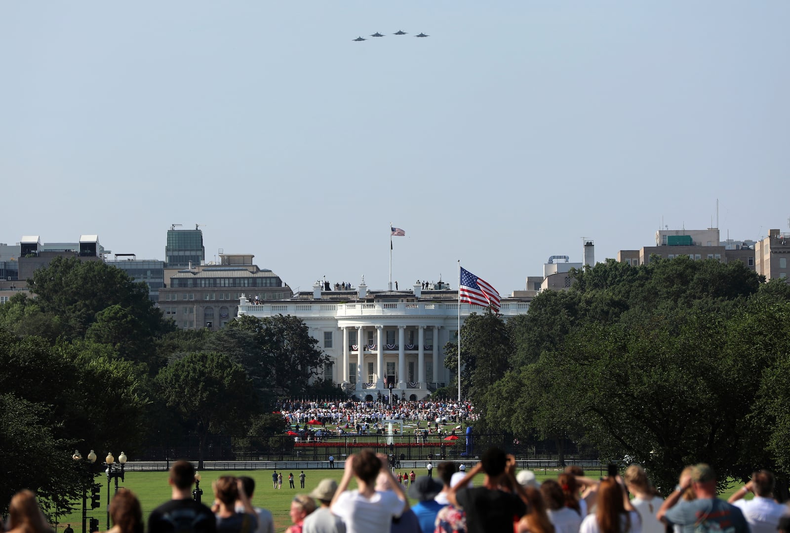 Military aircraft conduct a flyover during a Fourth of July celebration at the White House, Friday, July 4, 2025, in Washington. (AP Photo/Rahmat Gul)