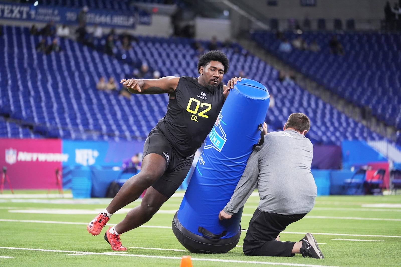 Toledo defensive lineman Darius Alexander runs a drill at the NFL football scouting combine in Indianapolis, Thursday, Feb. 27, 2025. (AP Photo/Michael Conroy)