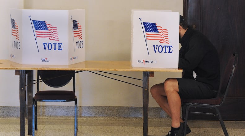 Voting at the Dayton Masonic Temple Tuesday Nov. 8, 2022. MARSHALL GORBY\STAFF