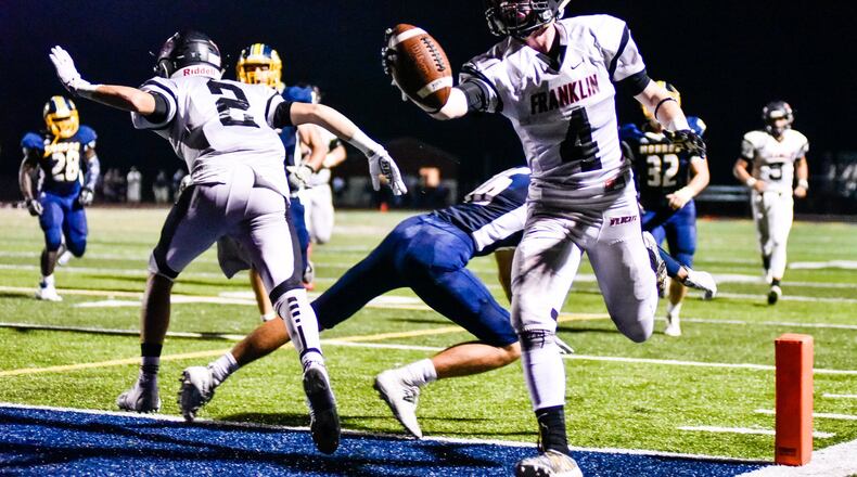 Franklinâs Bret Dalton carries the ball in for a touchdown during their football game Friday, Sept. 20, 2019 at Monroe High School. Franklin defeated Monroe 35-7. NICK GRAHAM/STAFF