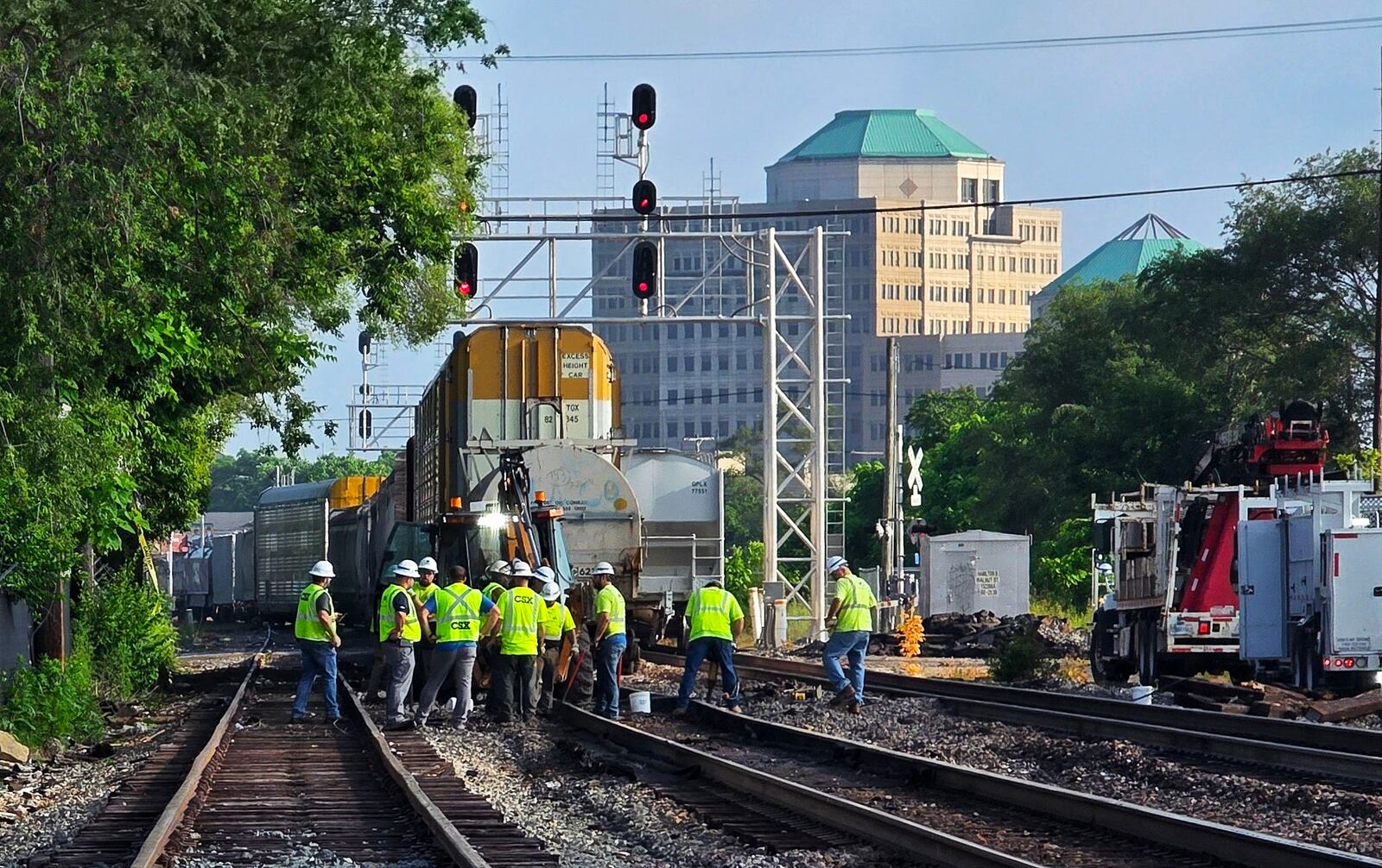 Two train cars derailed as a train passed through Hamilton on Thursday night, June 5, 2025. No one was injured. Officials and workers were still at the scene Friday morning to get the train back on track as multiple crossings in the city were blocked. NICK GRAHAM/STAFF