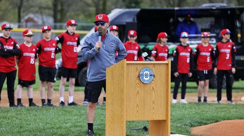West Side Little League coach Kenny coomer speaks to the crowd as West Side Little League formally kicked off its $1 million capital fundraising campaign on Monday, April 25, 2022, as well as honoring the 2021 Tom Seaver division Champions, who finished as runners-up in the Little League World Series last season. Hamilton Mayor Pat Moeller announced that the Hamilton CIC announced it would chip in the first $300,000 designated for player and fan safety improvements. NICK GRAHAM/STAFF