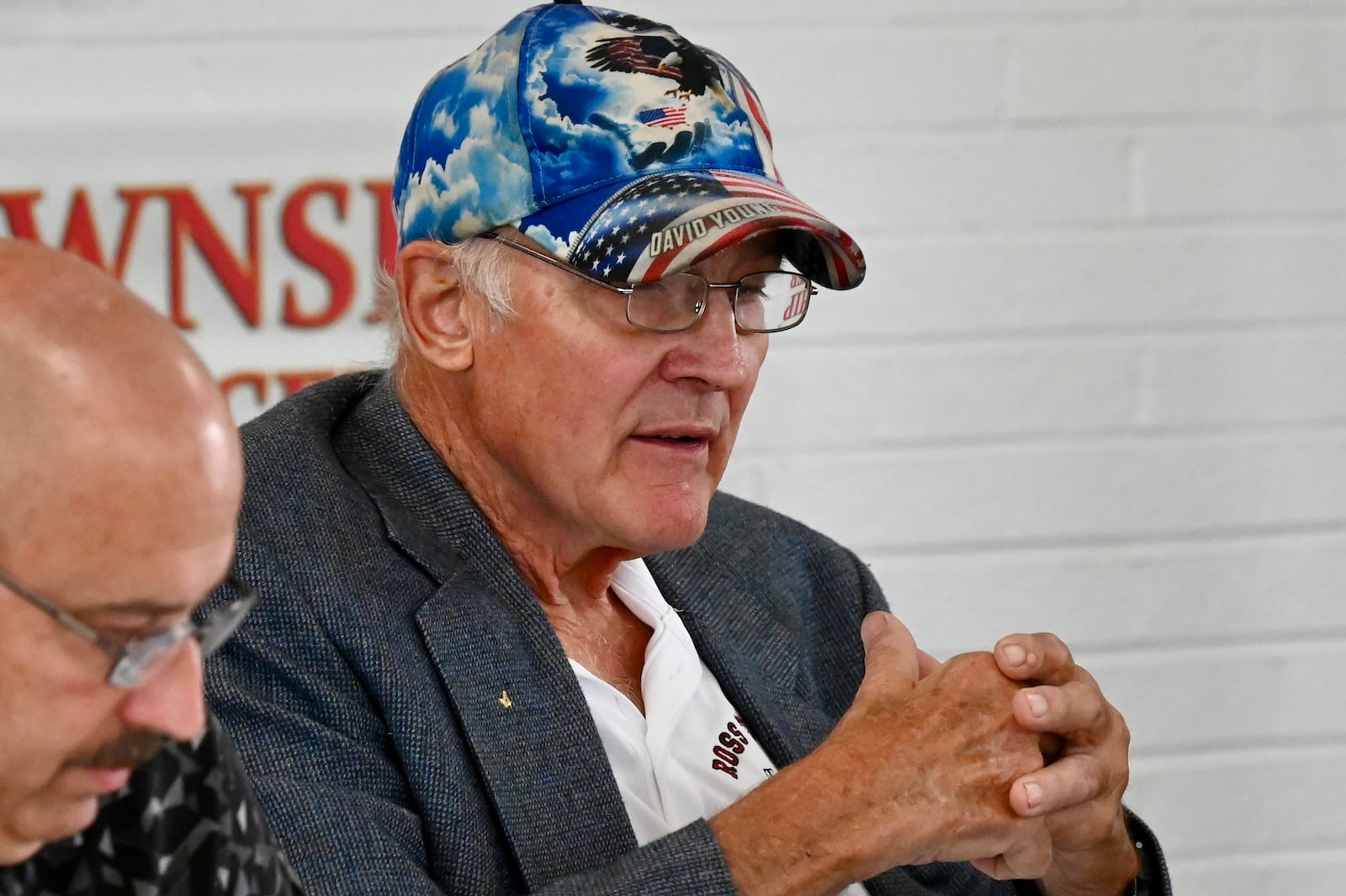 For the second consecutive meeting, Ross Twp. residents on Aug. 7, 2025, showed up calling for Trustee David Young to resign following racist comments he made on a Facebook post following the Cincinnati brawl in late July. Trustees called a special meeting on July 31, 2025, to address the comments and the fallout. Young apologized but refused to resign after being asked by residents and fellow trustees. He's seeking another term as trustee in this fall's election. Pictured is Young talking about why he posted racists comments, including use of an African-American slur, on a special media post concerning the massive brawl in Cincinnati. MICHAEL PITMAN/STAFF
