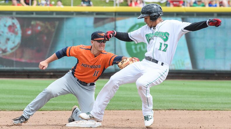Dayton’s Jose Siri tries to avoid a tag by Bowling Green’s Michael Brosseau during the sixth inning of a game on Sunday afternoon at Fifth Third Field. Siri was called out on the play. Contriubted Photo by Bryant Billing