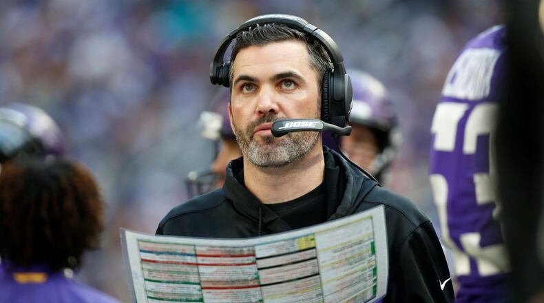 In this Dec. 16, 2018, file photo, Minnesota Vikings interim offensive coordinator Kevin Stefanski watches from the sideline during the first half of an NFL football game against the Miami Dolphins in Minneapolis. The Cleveland Browns are hiring Stefanski as their new coach, a person familiar with the decision told the Associated Press. Stefanski agreed to accept the position Sunday, Jan. 12, 2020, a day after Minnesota was beaten by San Francisco in the NFC playoffs, according to the person who spoke to the AP on condition of anonymity because the team has not announced the decision. (AP Photo/Bruce Kluckhohn, File)