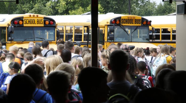 Social distancing — in hallways, on buses and in classrooms — will be a challenge if Ohio’s K-12 schools reopen in August. FILE PHOTO