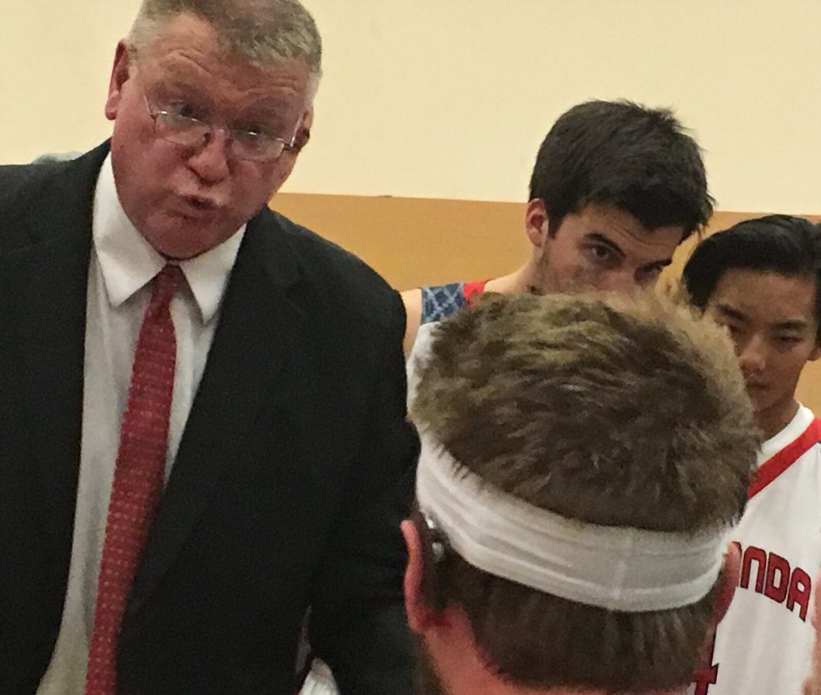 First-year Talawanda coach Tim Reed makes a point during a timeout Friday night in Oxford. The Braves lost to Fenwick 64-40 in season-opening play. RICK CASSANO/STAFF