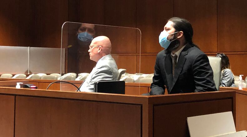 Brandon Dunham, at right listens in September with lawyer Jeff Meadows during final arguments in a trial in Warren County Common Pleas Court. On Tuesday, he was sentenced to four years in prison.