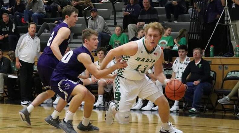 Badin’s Justin Pappas (13) gets a step on Elder’s Matthew Luebbe (10) during Tuesday night’s game at Mulcahey Gym in Hamilton. The host Rams won 57-53. CONTRIBUTED PHOTO BY TERRI ADAMS
