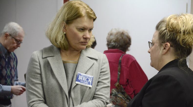 Twelfth District Court of Appeals Judge candidate Mary Lynne Birck talks with Butler County Probabte Judge candidate Heather Cady ahead of the Miami Regionals candidates forum at the Miami Hamilton Downtown center on Tuesday, Feb. 11, 2020. MICHAEL D. PITMAN/STAFF