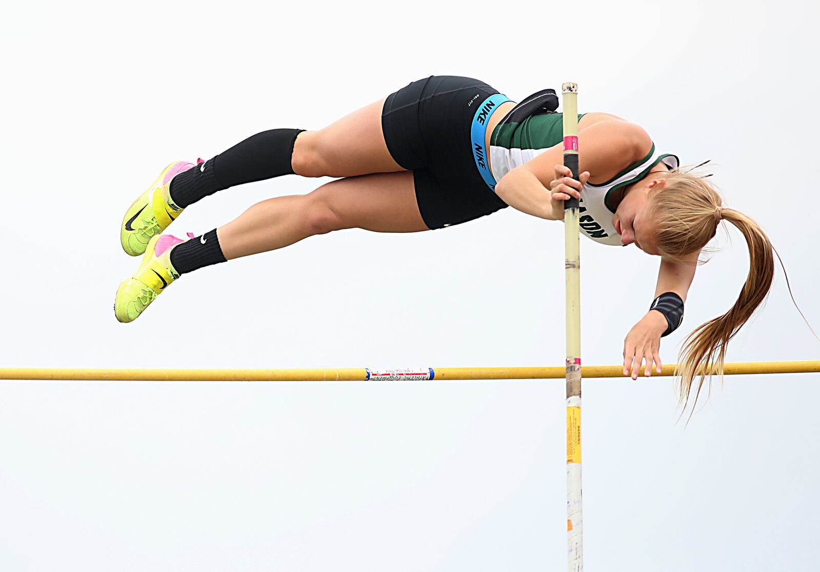 Nicole Bagby of Mason competes in the pole vault Friday during the Greater Miami Conference track & field meet on Dwire Field at Atrium Stadium in Mason. CONTRIBUTED PHOTO BY E.L. HUBBARD