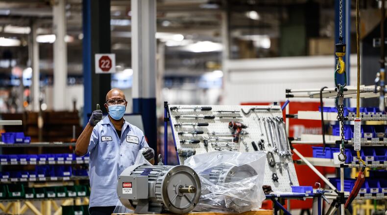 Workers are back to work at the Dayton Phoenix Group on Kuntz Road in the Old Dayton business park. The roof and the walls were severely damaged by the Memorial Day 2019 tornados. JIM NOELKER/STAFF