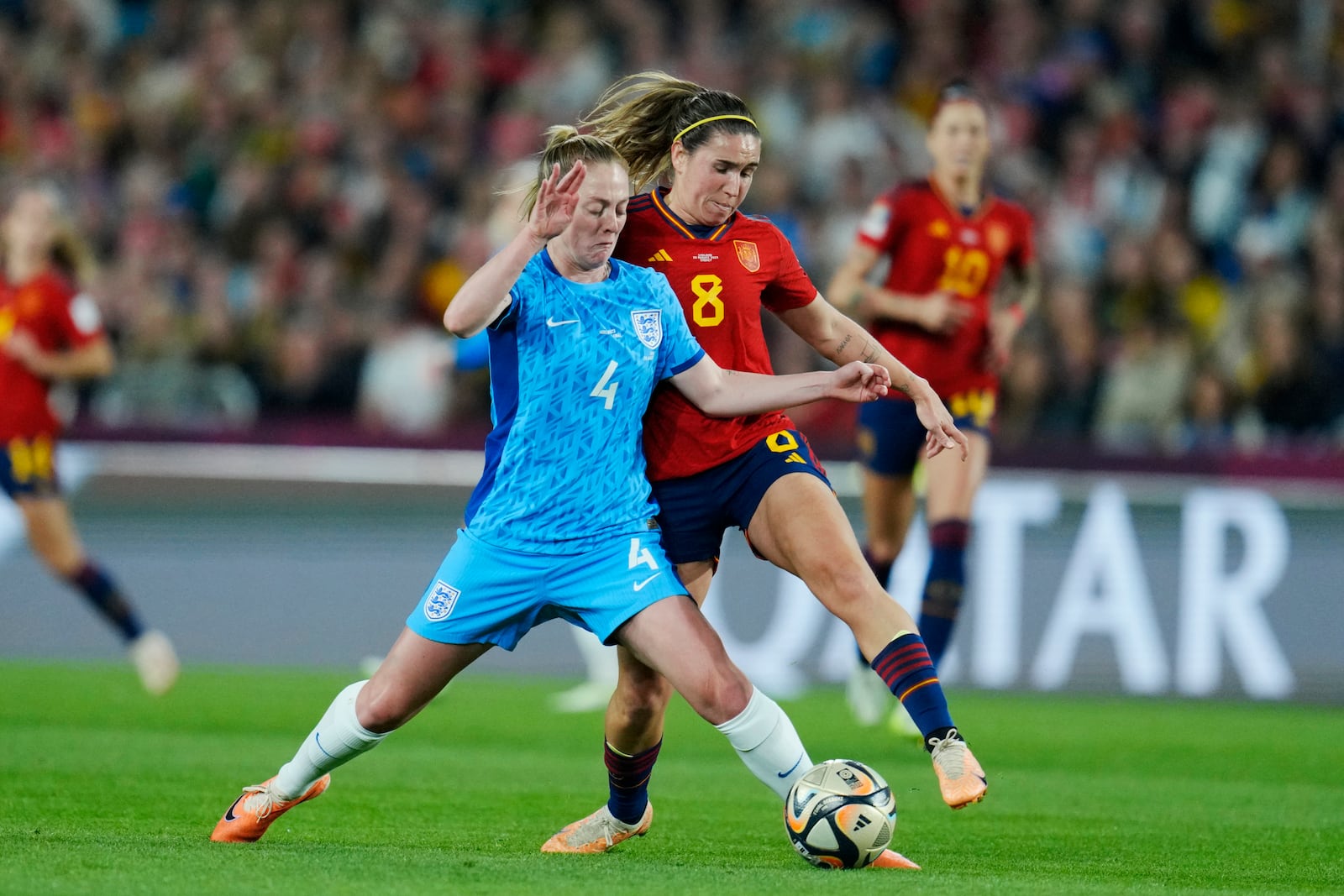 FILE - England's Keira Walsh, left, vies for the ball with Spain's Mariona Caldentey during the Women's World Cup soccer final between Spain and England at Stadium Australia in Sydney, Australia, Sunday, Aug. 20, 2023. (AP Photo/Abbie Parr, File0