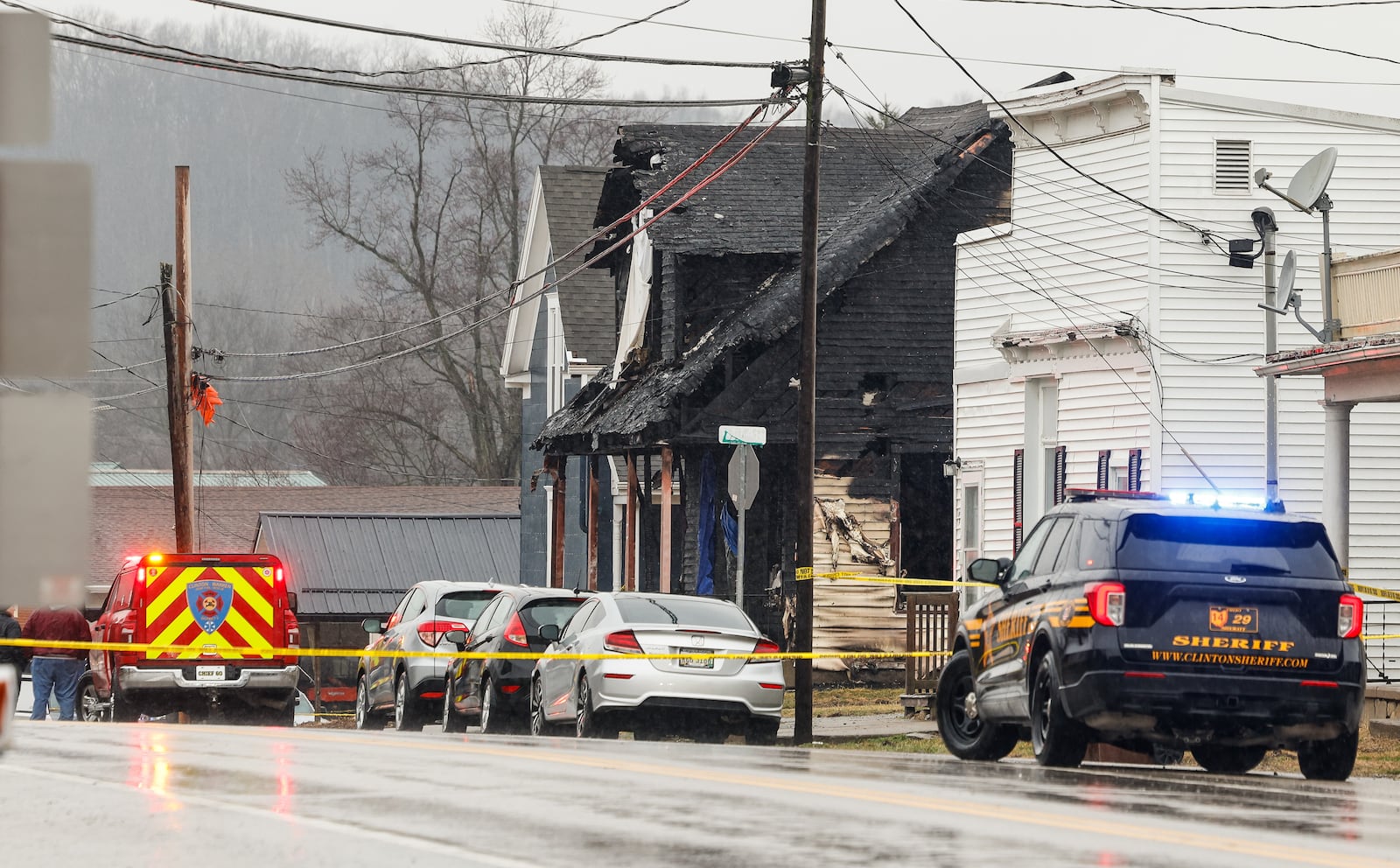 One woman and four children are dead, another child is possibly missing and a man is in the hospital Tuesday, March 3 after a house fire in Clarksville. Nick Graham/Staff
