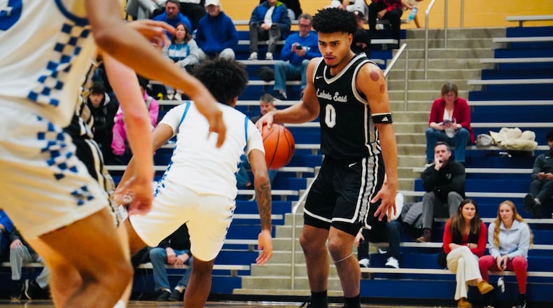 Lakota East's Trey Perry handles the ball during the Thunderhawks' game against Hamilton on Friday night. Chris Vogt/CONTRIBUTED