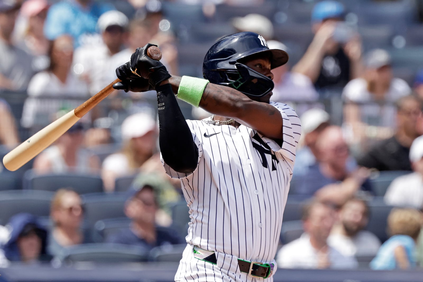 New York Yankees' Jazz Chisholm Jr. hits a three-run triple during the third inning of a baseball game against the Athletics, Sunday, June 29, 2025, in New York. (AP Photo/Adam Hunger)