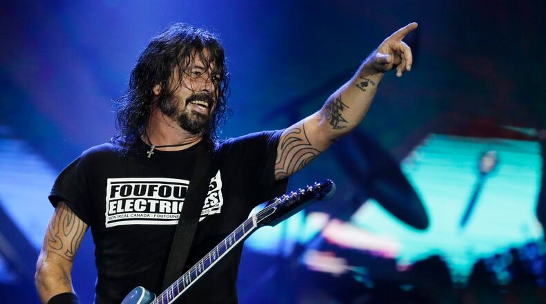 FILE - In this Sept. 29, 2019, file photo, Dave Grohl of the band Foo Fighters performs at the Rock in Rio music festival in Rio de Janeiro, Brazil. The band will perform at Madison Square Garden on June 20. (AP Photo/Leo Correa, File)