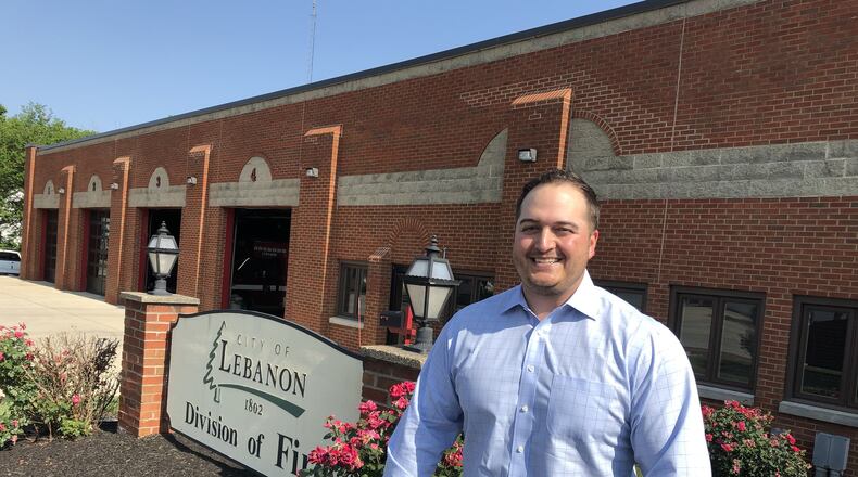 Ryan Powers stands in front of the Lebanon fire station he wants to redevelop as offices, meeting rooms, shared-working areas. Powers also talked of leasing part of the building to a brewpub or restaurant. STAFF/LAWRENCE BUDD