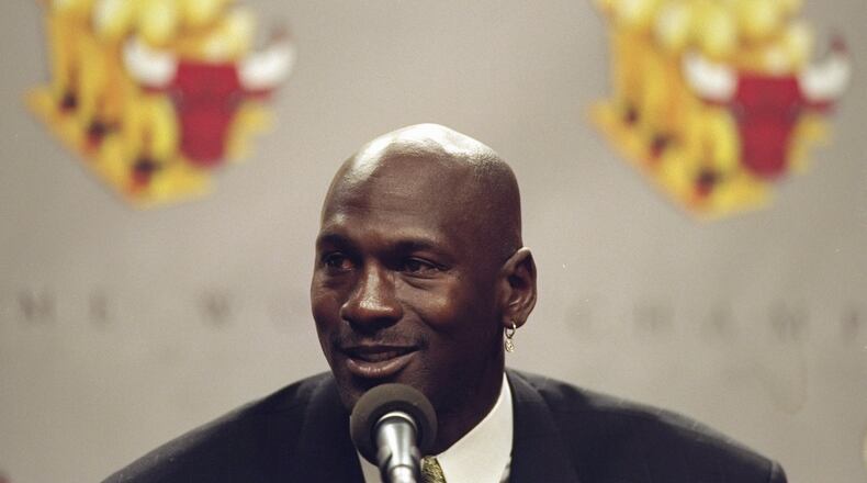 13 Jan 1999: Michael Jordan of the Chicago Bulls during a press conference to anounce Jordans retirement at the United Center in Chicago, Illinois.