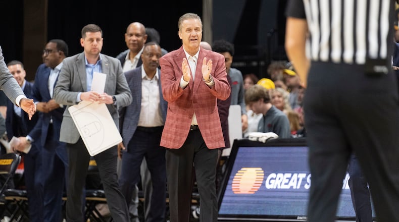 Arkansas head coach John Calipari claps during the first half of an NCAA college basketball game against Missouri Saturday, March 7, 2026, in Columbia, Mo. (AP Photo/L.G. Patterson)