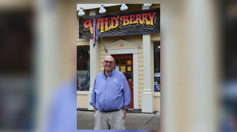 Marc Biales stands in front of the High Street Wild Berry store as the business marks 50 years in operation, most of that time in its present location. The early years saw him located in several other places within blocks of the current store. CONTRIBUTED/BOB RATTERMAN