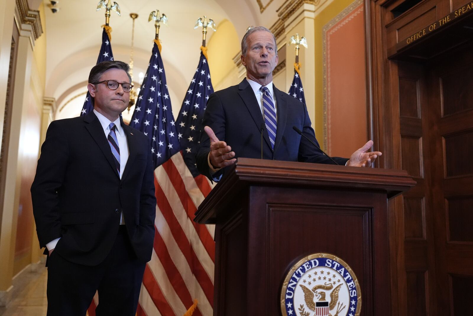 Speaker of the House Mike Johnson, R-La., left, and Senate Majority Leader John Thune, R-S.D., make statements to reporters ahead of vote in the House to pass a bill on President Donald Trump's top domestic priorities of spending reductions and tax breaks, at the Capitol in Washington, Thursday, April 10, 2025. (AP Photo/J. Scott Applewhite)