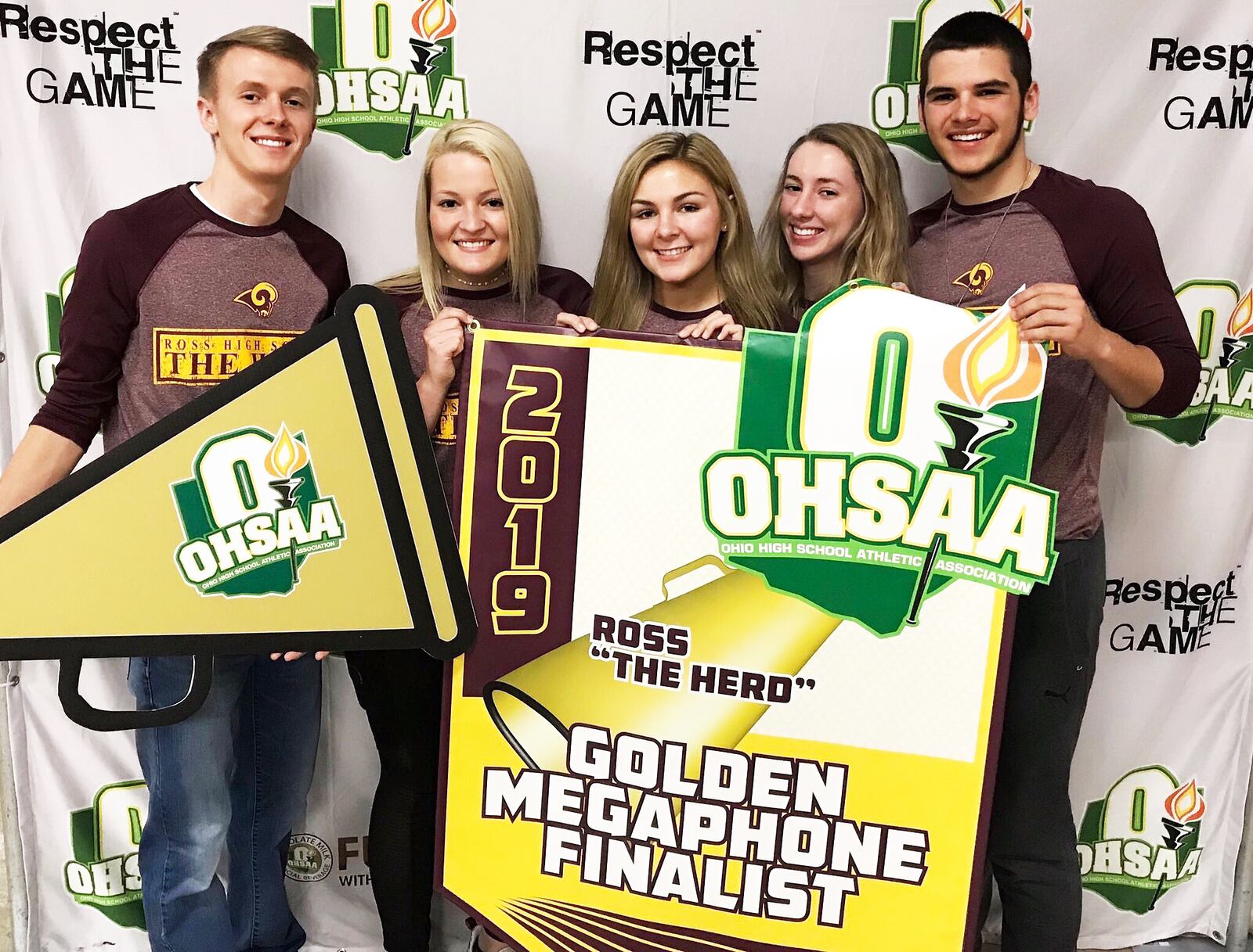 Ross High School’s student cheering section, known as “The Herd,” was represented (left to right) in Columbus by seniors Steven Knebel, Whitley Arno, Elizabeth Roberts, Jenna Hill and Keegan Nickoson at the state boys basketball tournament last weekend. Ross was one of 14 finalists for the Ohio High School Athletic Association’s Golden Megaphone Award this year. SUBMITTED PHOTO