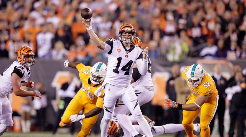 CINCINNATI, OH - SEPTEMBER 29: Andy Dalton #14 of the Cincinnati Bengals throws a pass during the second quarter of the game against the Miami Dolphins at Paul Brown Stadium on September 29, 2016 in Cincinnati, Ohio. (Photo by Andy Lyons/Getty Images)