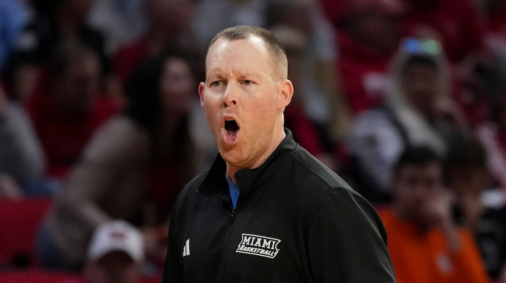 Miami (Ohio) head coach Travis Steele reacts during the second half of an NCAA college basketball game against Bowling Green, Friday, Feb. 20, 2026, in Oxford, Ohio. (AP Photo/Jeff Dean)