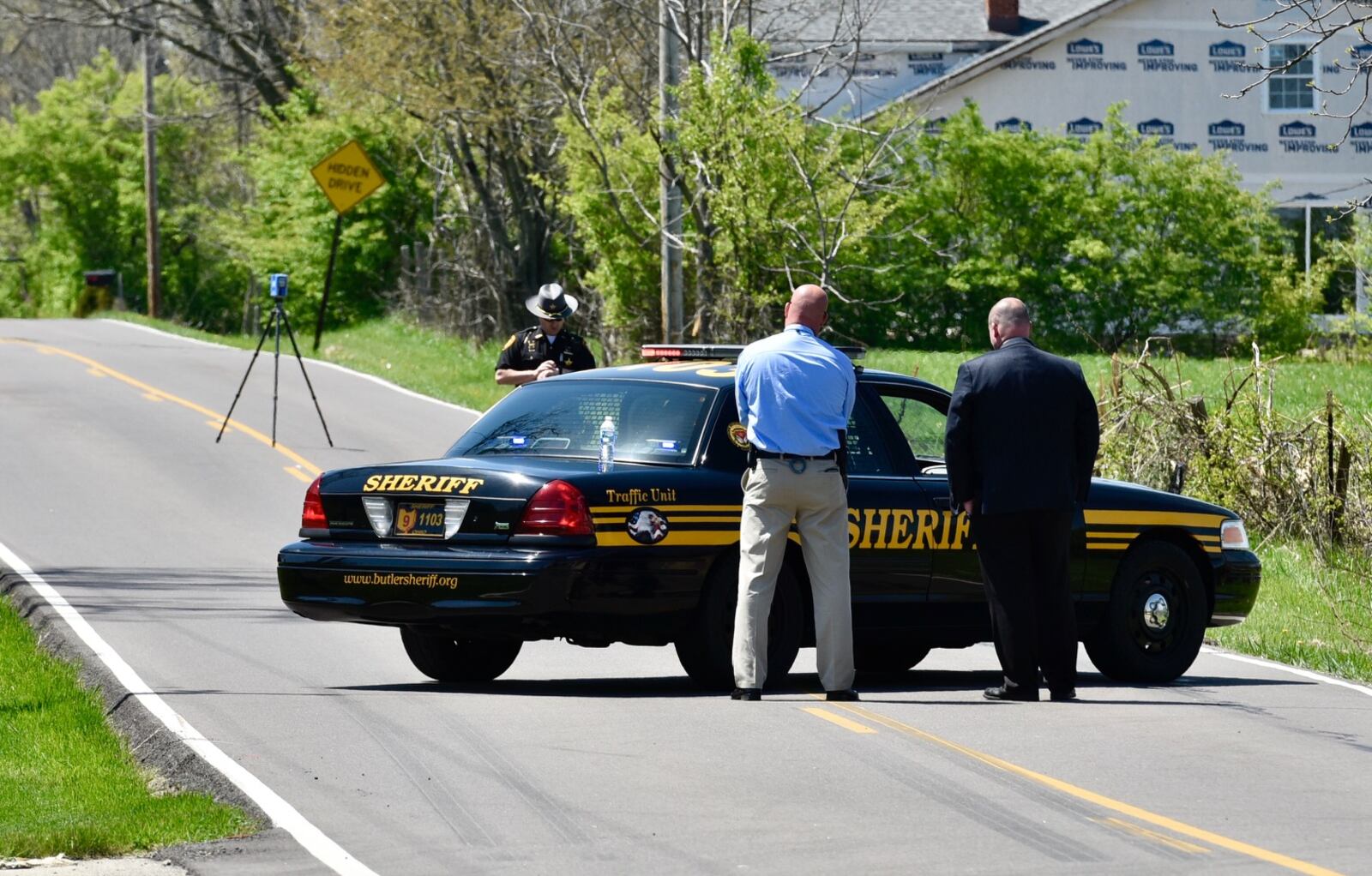 Millikin Road is blocked Monday, April 30, between Butler Warren Road and Cincinnati Dayton Road in Butler County as police investigate the scene of a fatal crash involving Monroe students. 