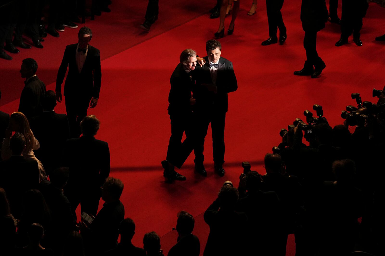 Director Wes Anderson, left, and Benicio del Toro pose for photographers upon departure from the premiere of the film 'The Phoenician Scheme' at the 78th international film festival, Cannes, southern France, Sunday, May 18, 2025. (AP Photo/Natacha Pisarenko)