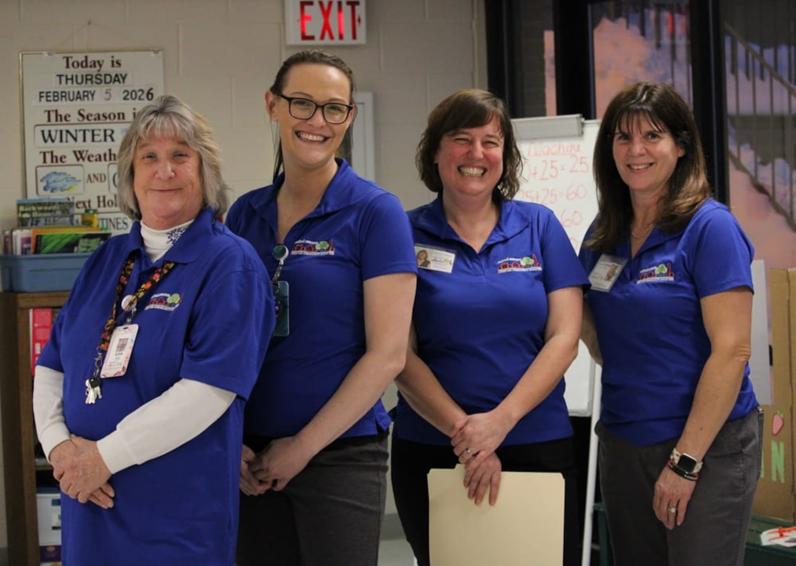 State-tested nurse aide and day center driver Lisa Shelley, left, Community Adult Day Center Director Stacey Frazho, Oxford Seniors Executive Director Emily Liechty and Activities Director Mary Richardson pose for a photo during the organization’s 25th anniversary celebration on Feb. 4, 2026. KATELYN ALUISE/CONTRIBUTED
