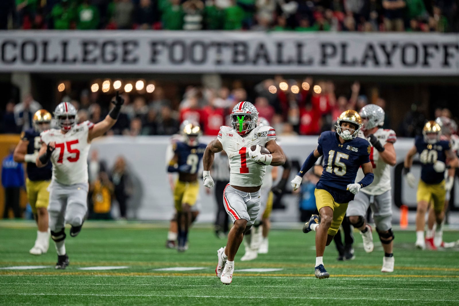 FILE - Ohio State running back Quinshon Judkins (1) runs with the ball against Notre Dame during the College Football Playoff national championship game Monday, Jan. 20, 2025, in Atlanta. (AP Photo/Jacob Kupferman, File)