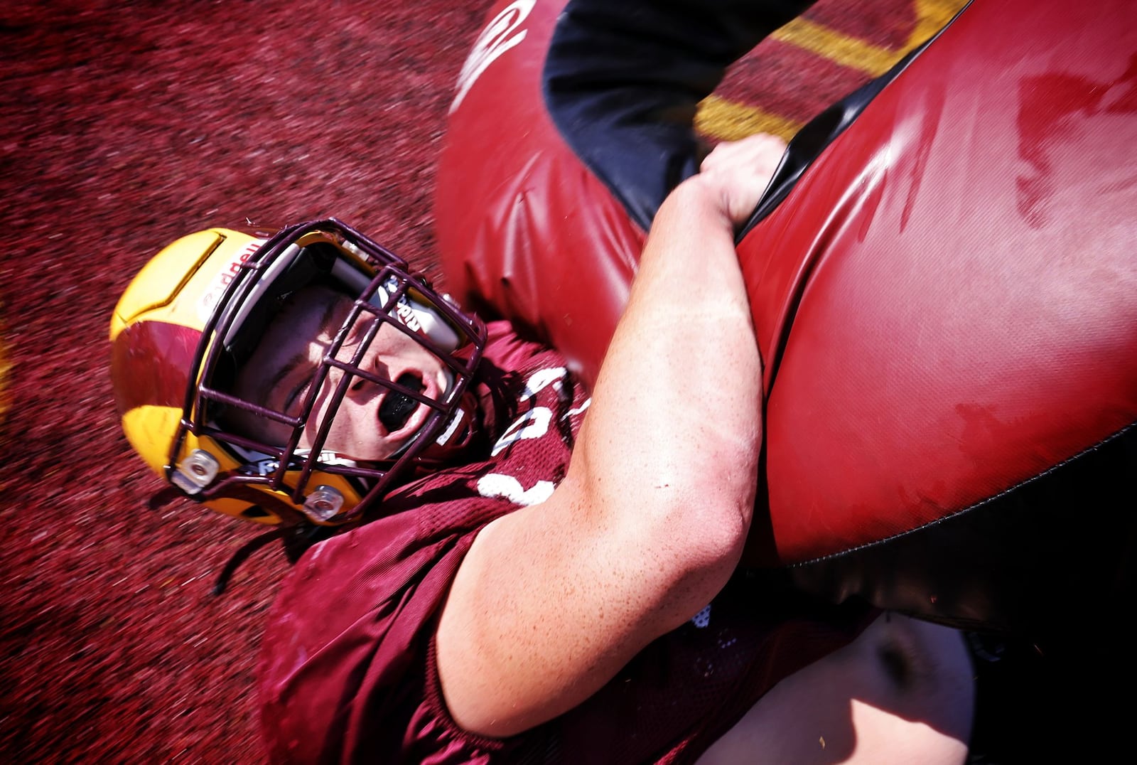 Ross running back Lucas Kunkel hits a tackle wheel during practice Tuesday, Sept. 2, 2025 at Ross High School. NICK GRAHAM/STAFF