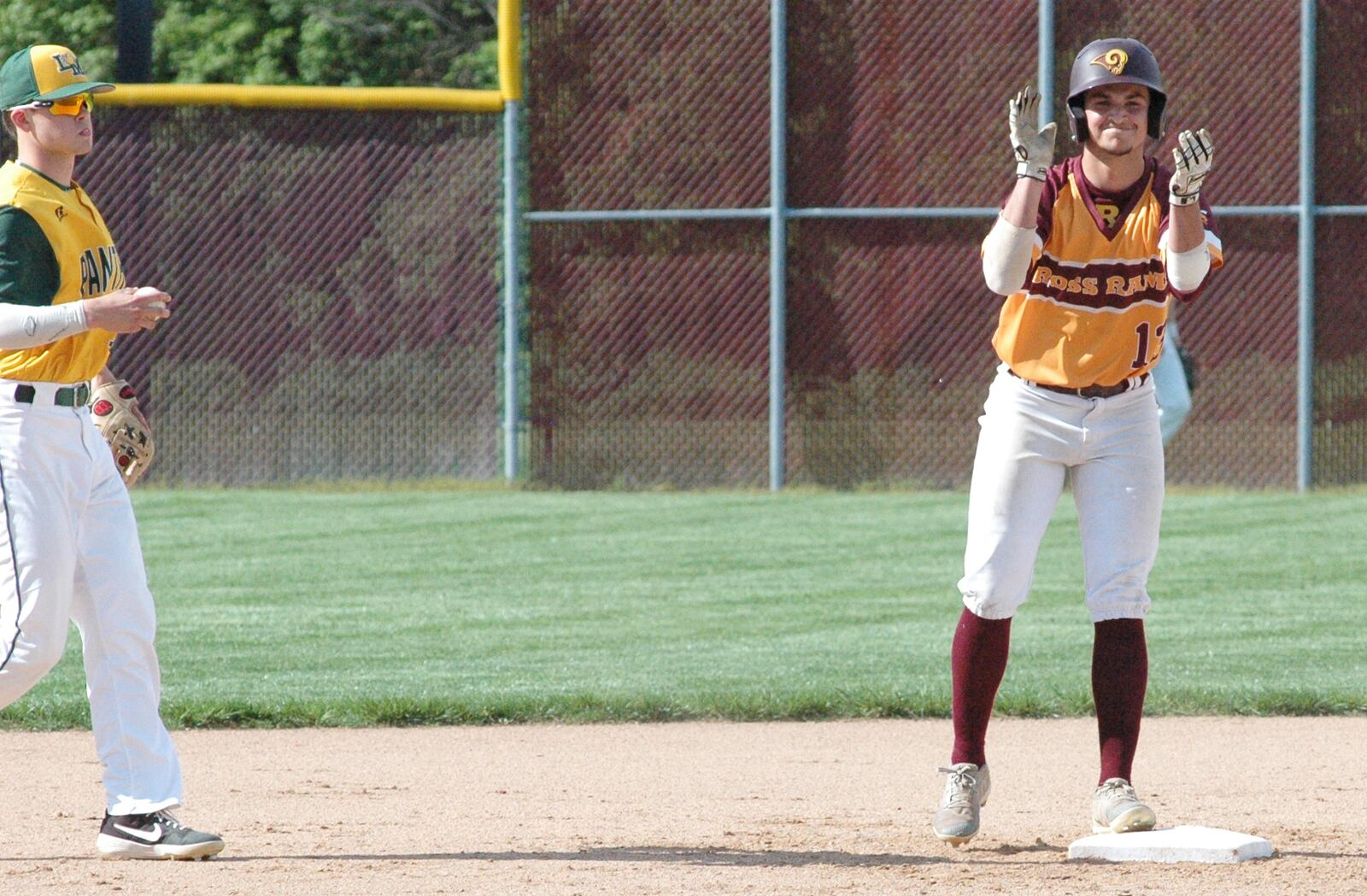 Ethan Hall of Ross reacts after reaching second base on a double Monday during a Southwest Ohio Conference baseball game against Little Miami in Ross Township. Ross won 2-1. RICK CASSANO/STAFF