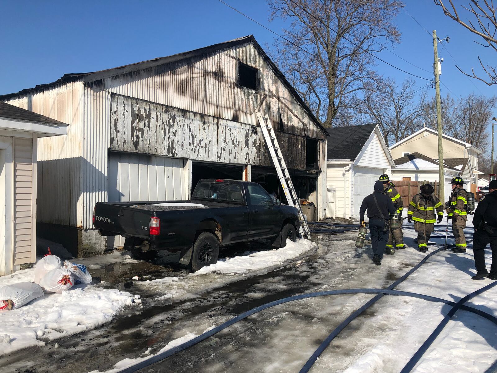 Middletown firefighters responded this morning to a report of a car and a garage on fire in the 700 block of Mary Etta Street. No one was injured in the fire that's under investigation, said Deputy Fire Chief Jeff Spaulding. RICK McCRABB/STAFF
