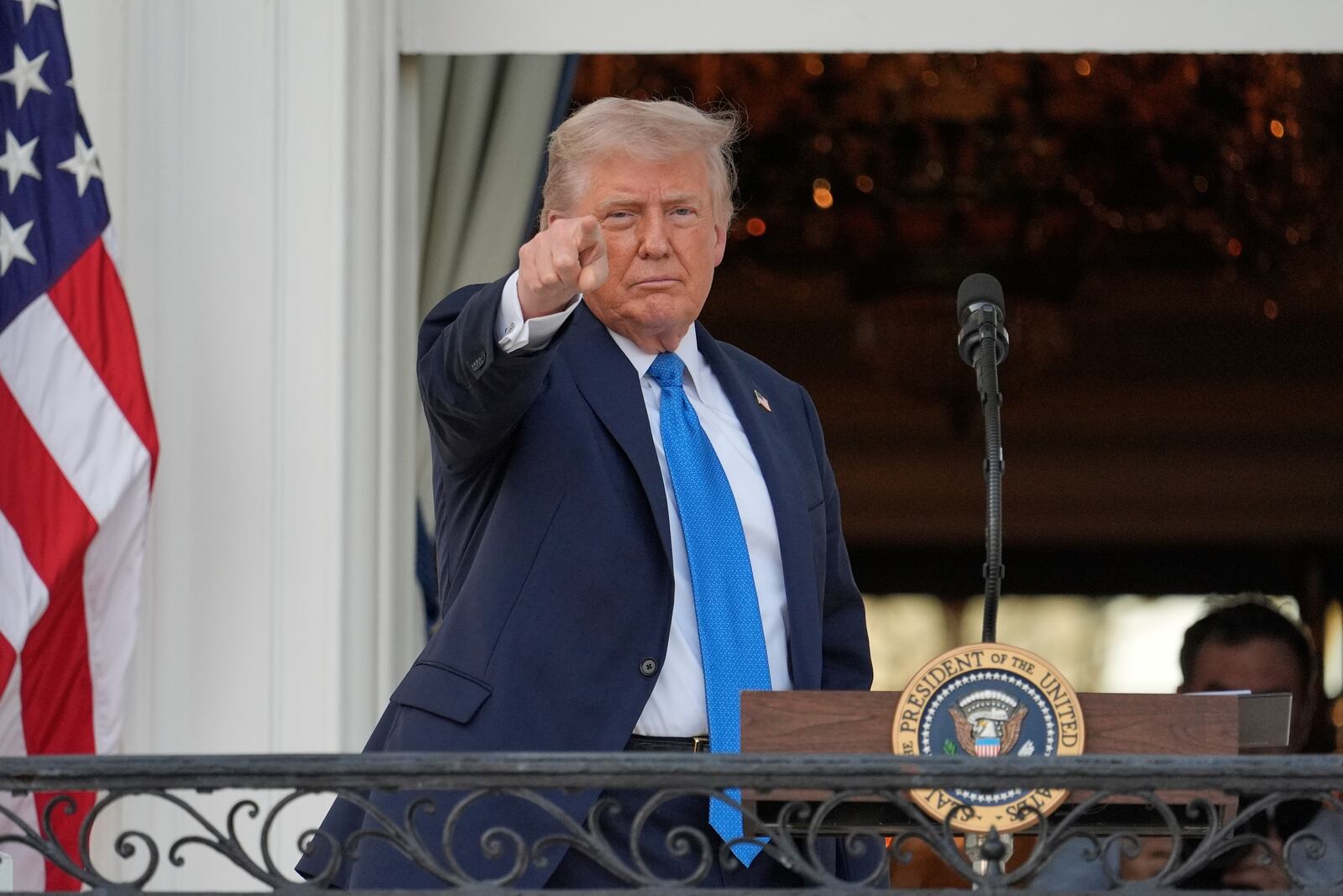 President Donald Trump gestures after speaking during a summer soiree on the South Lawn of the White House, Wednesday, June 4, 2025, in Washington. (AP Photo/Alex Brandon)