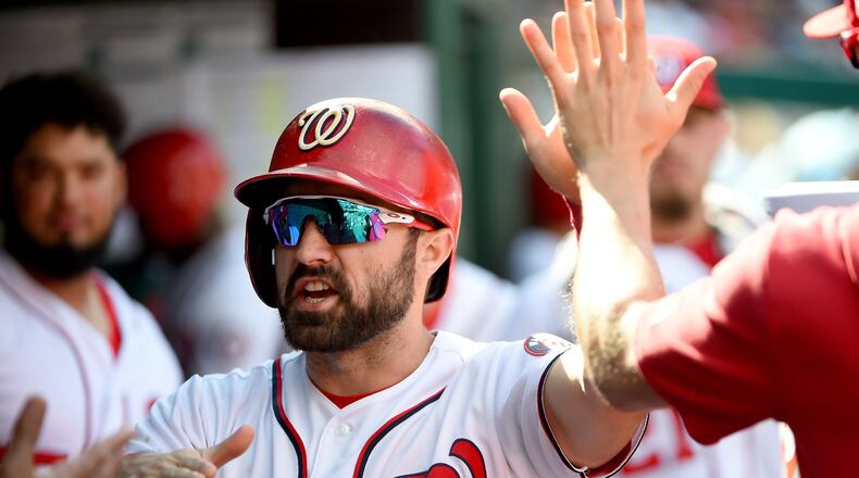 The Nationa’s Adam Eaton celebrates with teammates after scoring during the sixth inning of game one of a doubleheader against the Philadelphia Phillies at Nationals Park on September 24, 2019 in Washington, DC. (Photo by Will Newton/Getty Images)