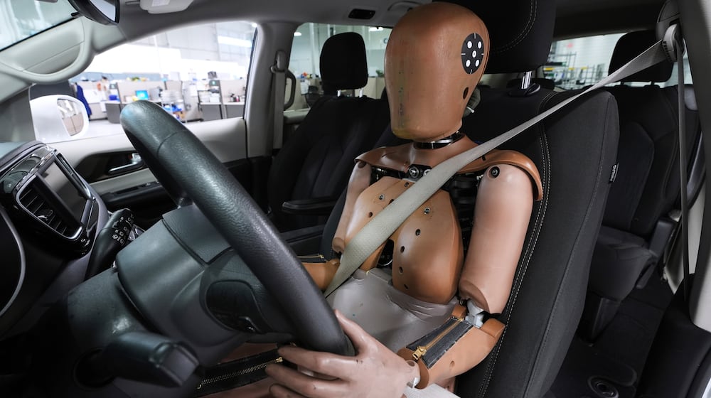 FILE - A THOR-5F female crash test dummy is shown in a driver's seat at Humanetics in Farmington Hills, Mich., June 10, 2025. (AP Photo/Paul Sancya, File)