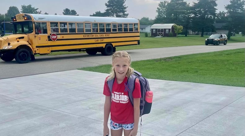 Kimberly Shope said she and husband Mike put their daughter Taylor on the school bus for her first day of fifth grade at Northwestern Elementary, excited to start the new school year Tuesday. The bus was hit by a minivan, one student was killed, and 23 injured. When Northwestern resumed classes Friday, Taylor rode the bus to school as deputies and others comforted students and parents. CONTRIBUTED