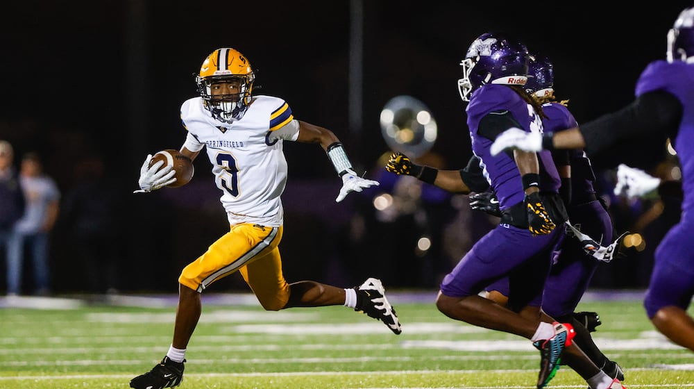 Springfield High School junior Braylon Keyes runs the ball during their game against Middletown on Friday, Nov. 14 at Barnitz Stadium. The Middies won 14-0. NICK GRAHAM / STAFF PHOTO