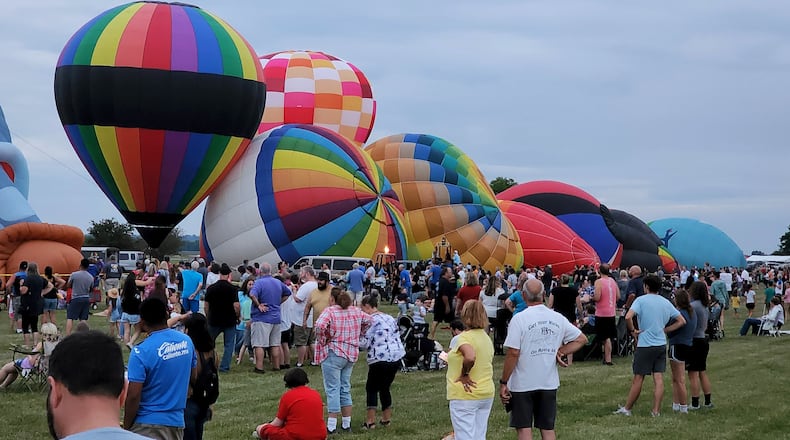 File photo: Opening day of The Ohio Challenge hot air balloon festival featured s balloon glow, fireworks and skydivers from Team Fastrax, craft vendors, food and more Friday night, July 15, 2022 at Smith Park in Middletown. NICK GRAHAM/STAFF