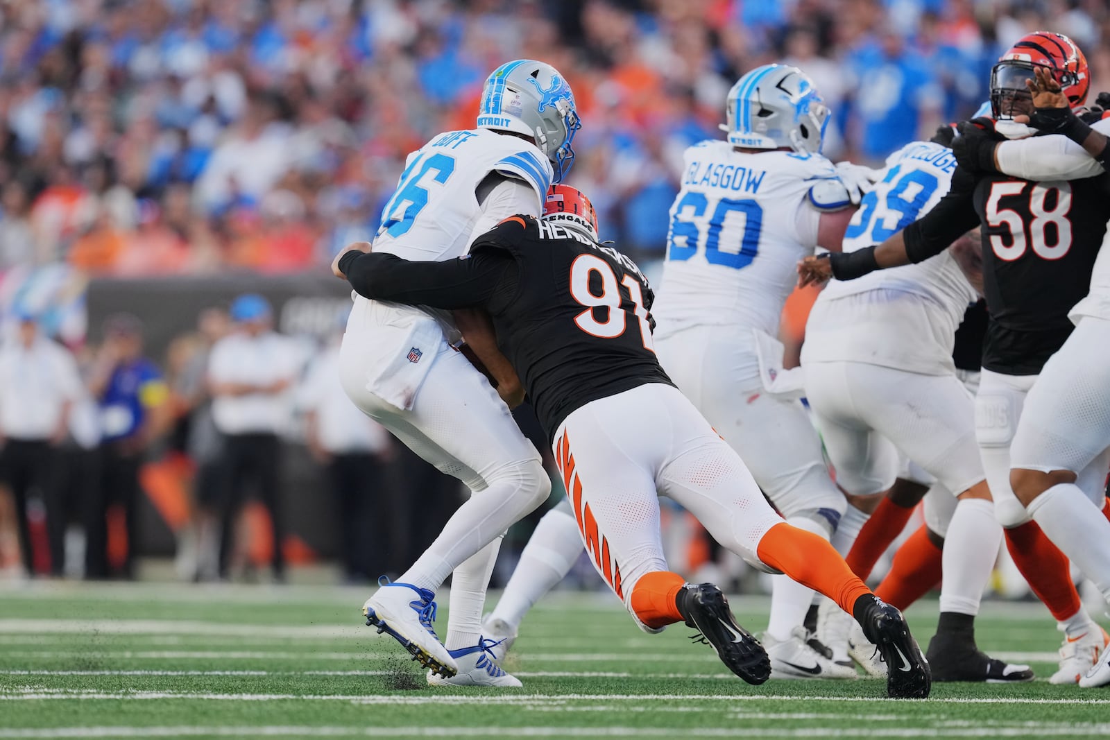 Cincinnati Bengals defensive end Trey Hendrickson (91) sacks Detroit Lions quarterback Jared Goff (16) during the second half of an NFL football game Sunday, Oct. 5, 2025, in Cincinnati. (AP Photo/Jeff Dean)