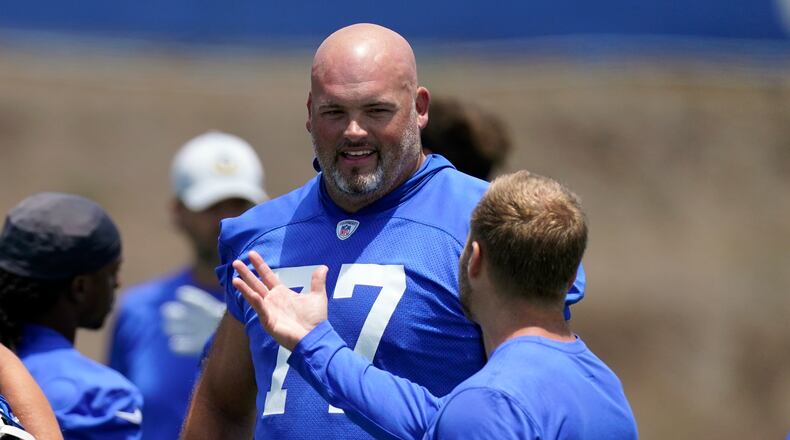 Los Angeles Rams head coach Sean McVay, right, talks with offensive tackle Andrew Whitworth during an NFL football practice Tuesday, June 8, 2021, in Thousand Oaks, Calif. (AP Photo/Mark J. Terrill)