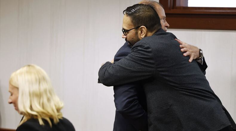 The retrial of Gurpreet Singh started Monday morning, April 29, 2024 before a 3-judge panel in Butler County Common Pleas Court in Hamilton. Singh hugged his defense attorney Thursday, May 9 when the defense rested its case. He is charged with capital murder for allegedly killing 4 members of his family in 2019 in West Chester Township. NICK GRAHAM/STAFF