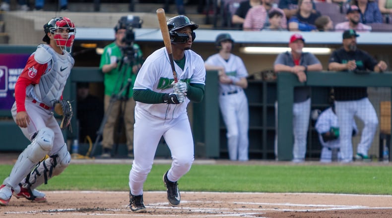 Cam Collier watches one his league-leading seven home runs during the Dragons recent homestand against Fort Wayne. Jeff Gilbert/CONTRIBUTED