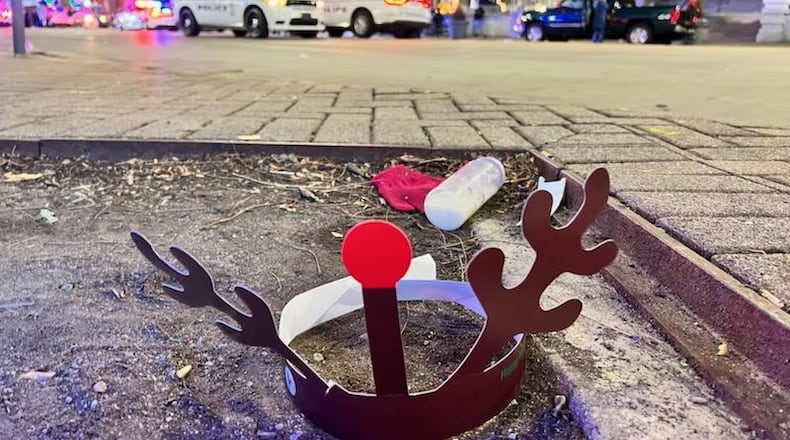 The parade at the Dayton Holiday Festival was stopped Friday night after reports of shots fired. Tom Gilliam/Contributed.